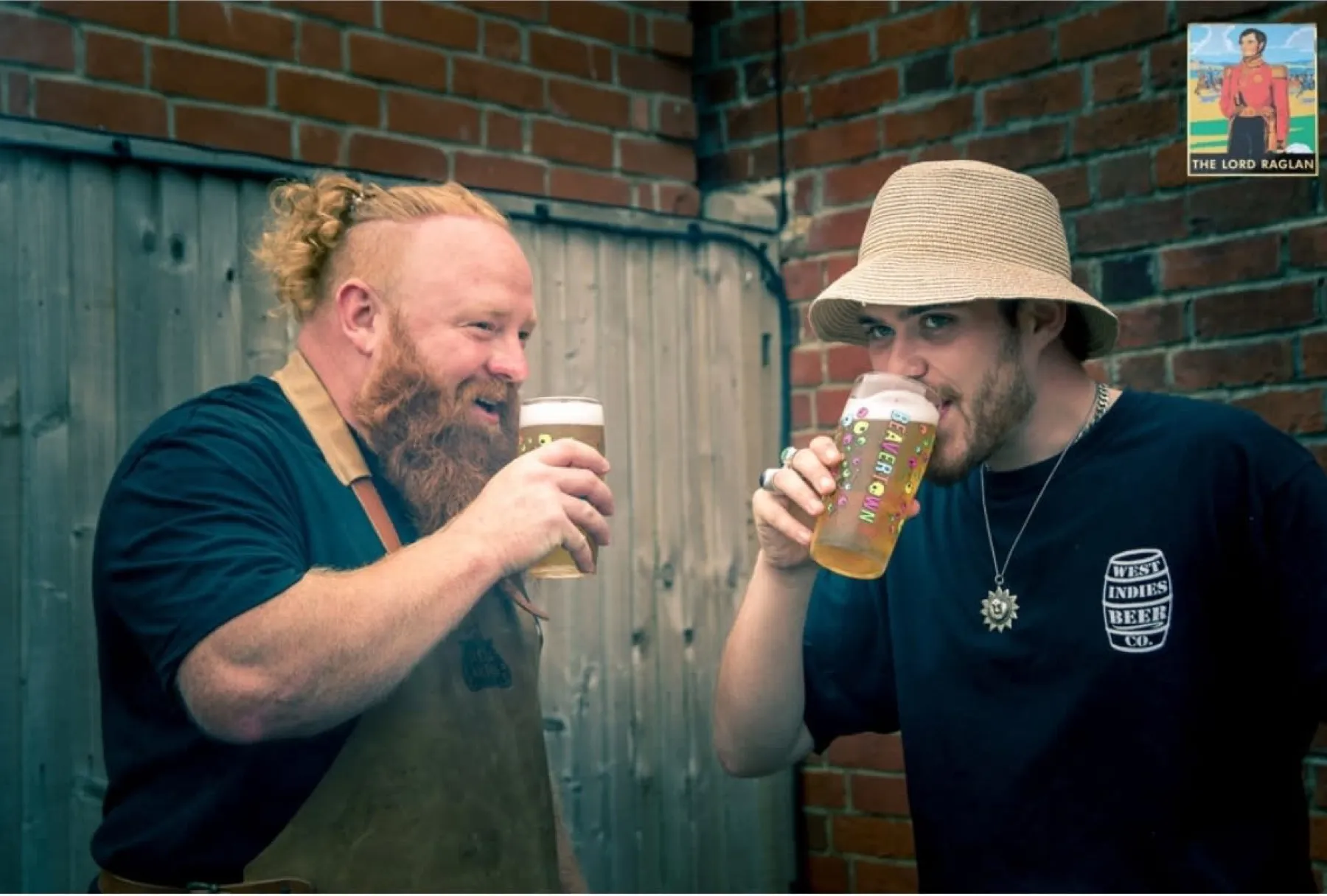 Two friends sharing a pint at The Lord Raglan